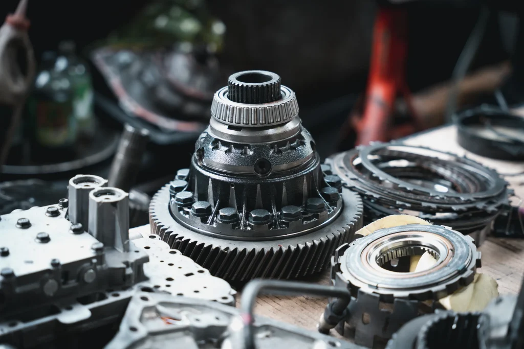 An assembled heavy-duty limited slip differential unit is ready for standard transmission repair installation on a workbench