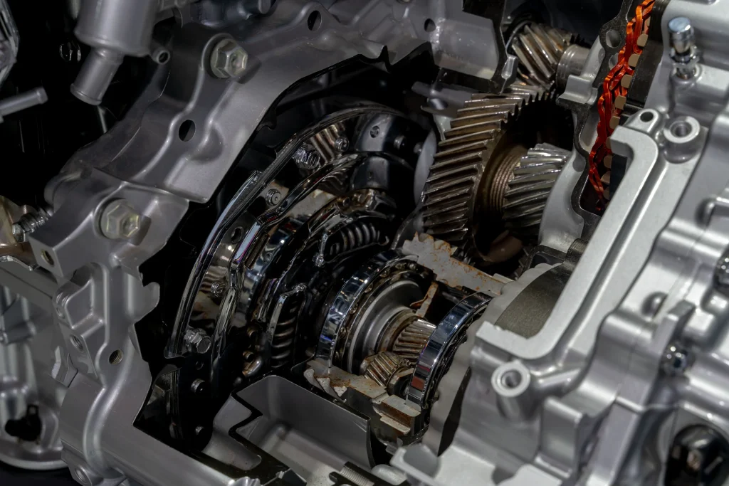 Detailed internal view of a vehicle gearbox showing parts that benefit from a regular transmission fluid change.