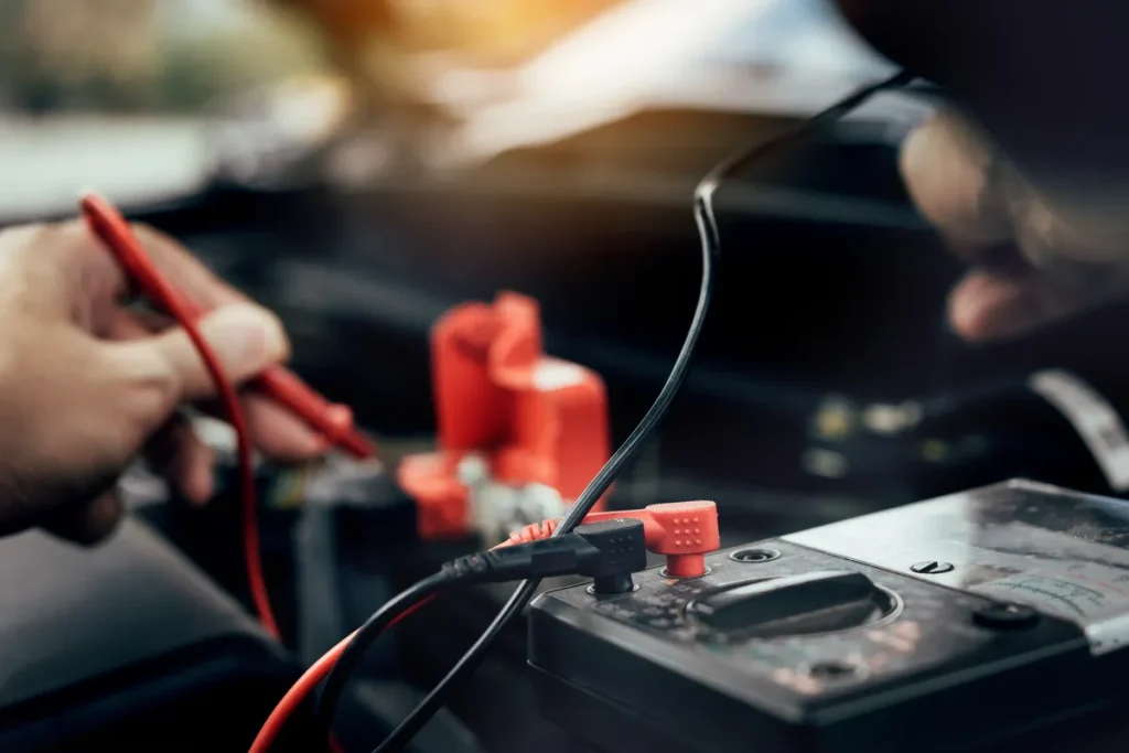 Close-up of a specialized tester for automotive electrical and battery services checking system load.